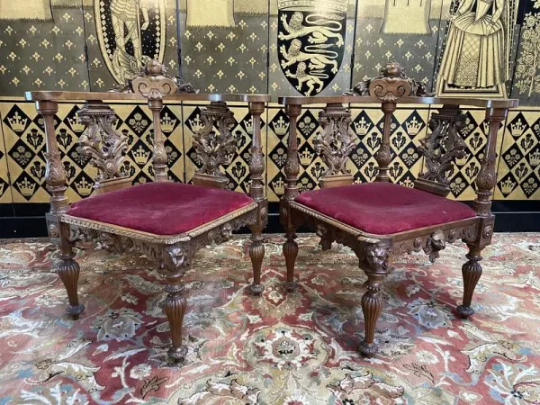 Pair of Italian carved wooden armchairs