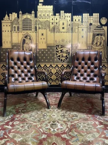 Paire de fauteuils Chesterfield anglais en cuir