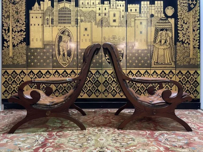 Pair of English Chesterfield leather armchairs