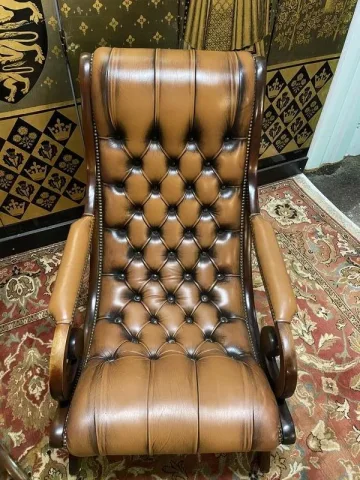 Paire de fauteuils Chesterfield anglais en cuir