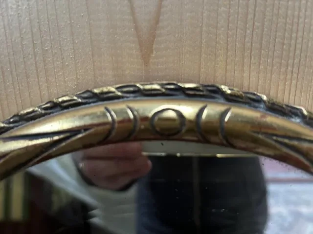 Miroir ovale en bois doré
