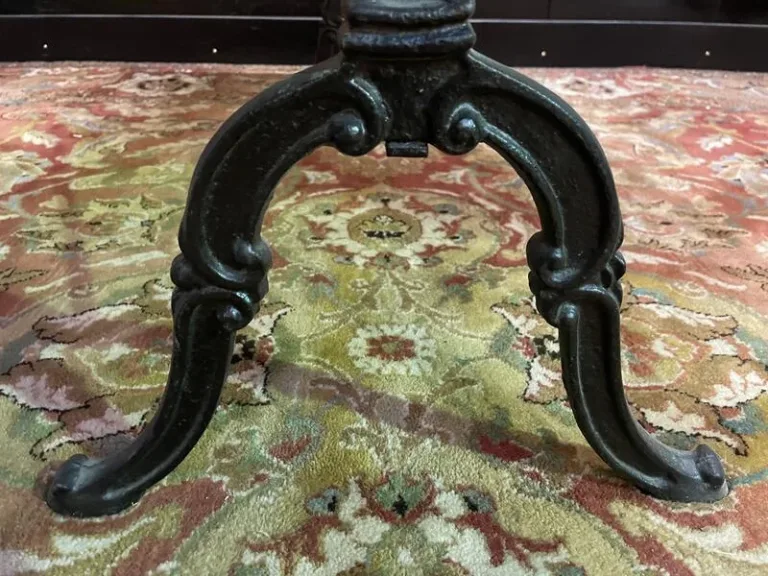 Cast iron and oak bistro table
