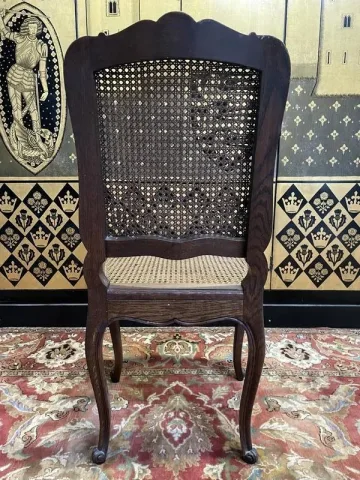 Suite de 6 chaises cannées style Louis XV en chêne