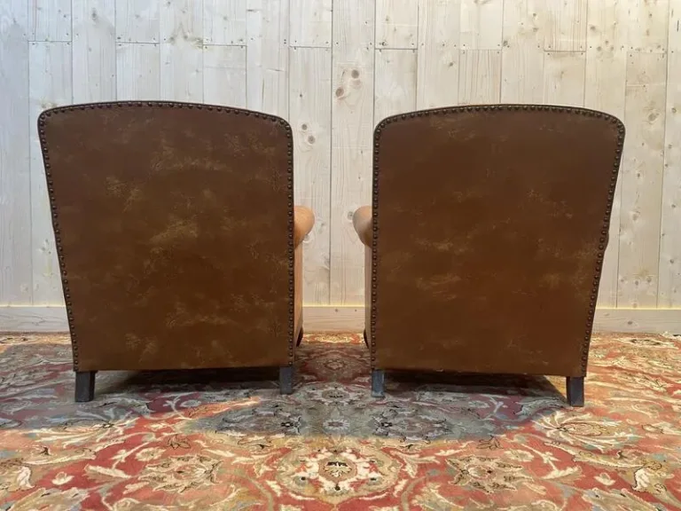 Paire de fauteuils Club en imitation cuir