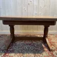 Table de salle à manger en chêne avec allonges intégrées