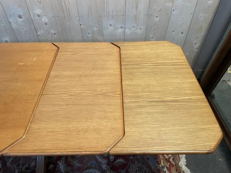 Table de salle à manger en chêne avec allonges intégrées