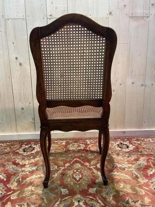 8 Louis XV period cane chairs