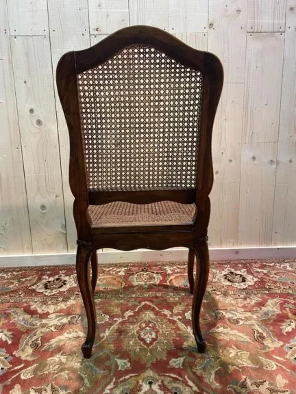 8 chaises époque Louis XV en cannage