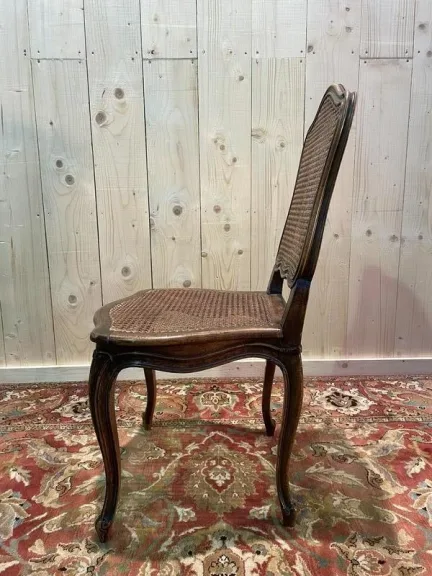 8 chaises époque Louis XV en cannage