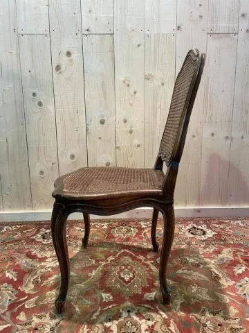 8 chaises époque Louis XV en cannage