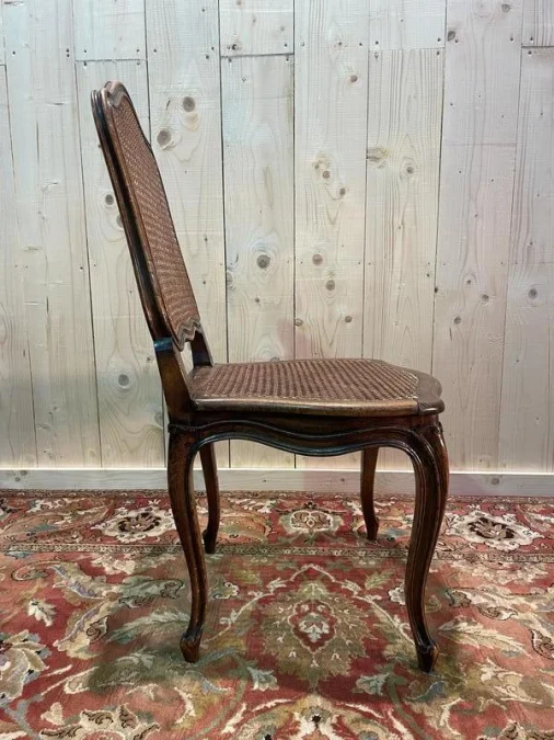 8 Louis XV period cane chairs