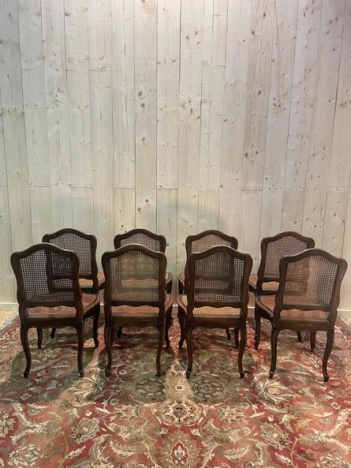 8 Louis XV period cane chairs