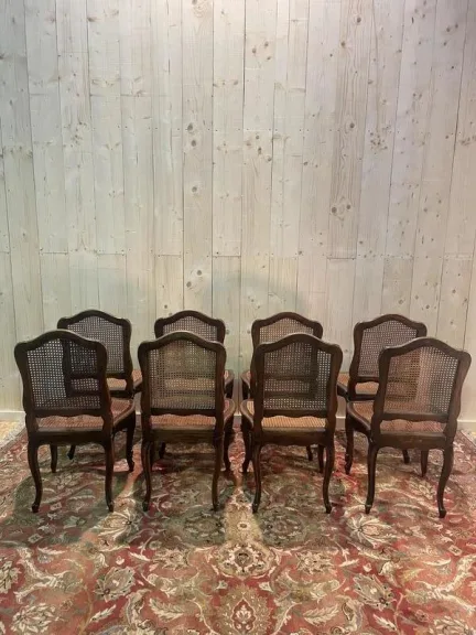 8 chaises époque Louis XV en cannage