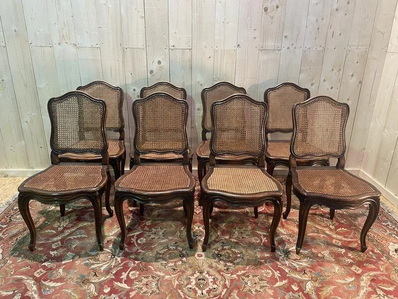 8 Louis XV period cane chairs
