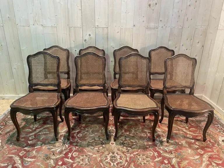 8 chaises époque Louis XV en cannage
