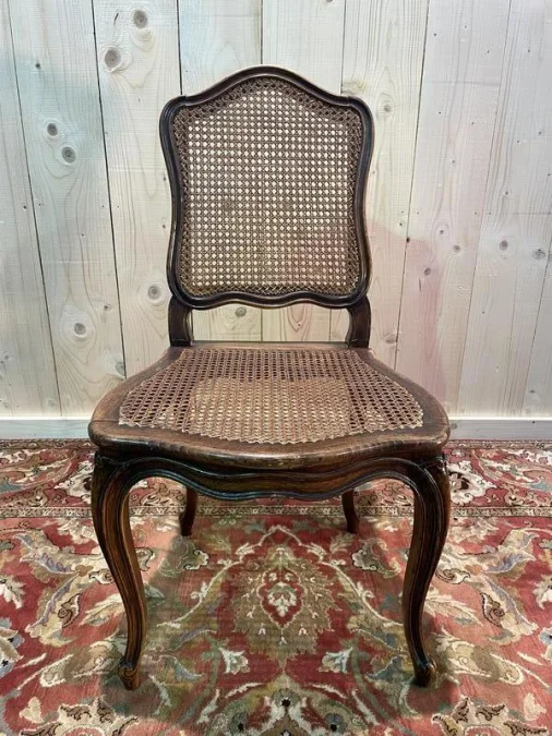 8 Louis XV period cane chairs