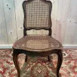 8 chaises époque Louis XV en cannage