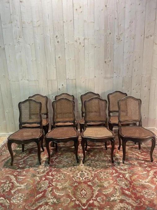 8 Louis XV period cane chairs