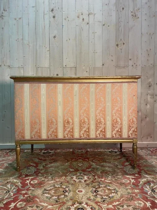 Louis XVI style bench in gilded wood.