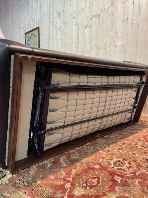 Black leather sofa bed 1970