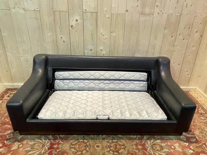 Black leather sofa bed 1970