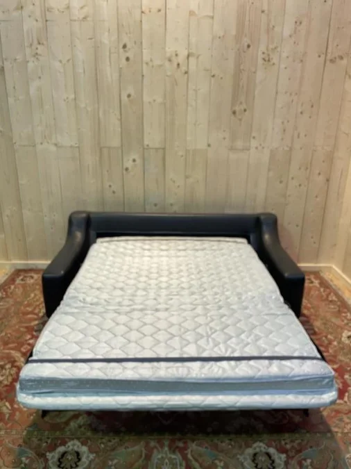Black leather sofa bed 1970