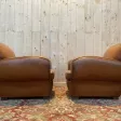 Paire de fauteuils Club en cuir Art Déco