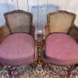 Paire de fauteuils - bergères de style Louis XV en cannage