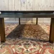 Table basse en métal doré et miroir 1970