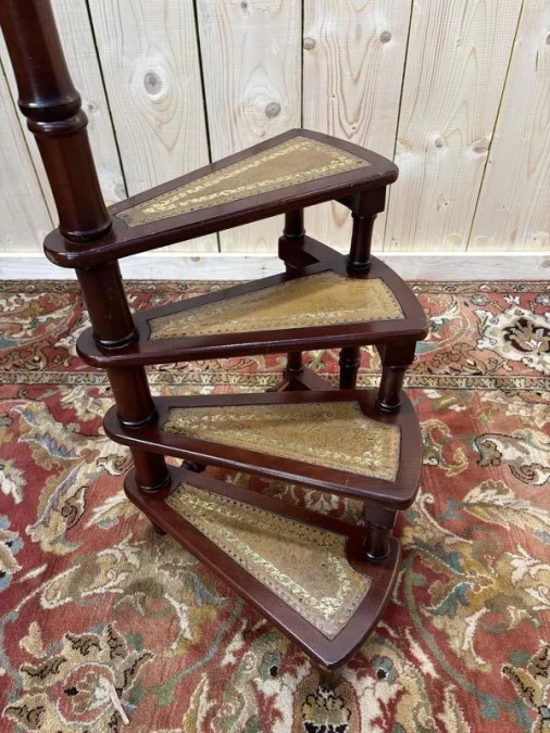 Library staircase with linden green leather