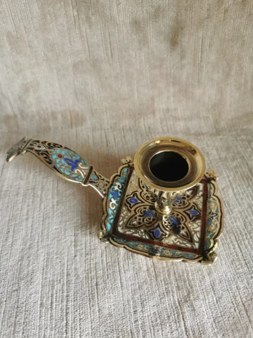 BRONZE AND ENAMEL CANDLESTICK