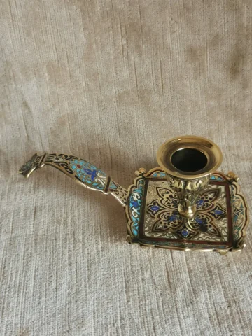 BRONZE AND ENAMEL CANDLESTICK