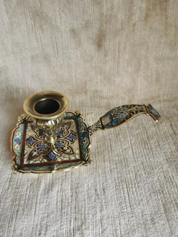 BRONZE AND ENAMEL CANDLESTICK
