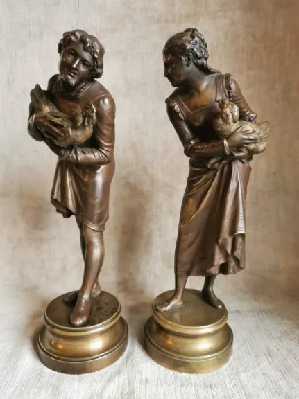 Paire de sujets en bronze patiné par Stella XIXe siècle