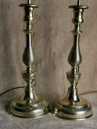 Paire de bougeoirs Louis Philippe en laiton poli