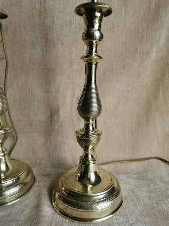 Paire de bougeoirs Louis Philippe en laiton poli