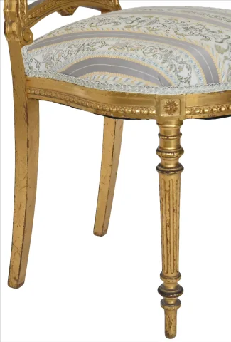 Pair of Louis XVI-style gilt wood chairs — Good condition