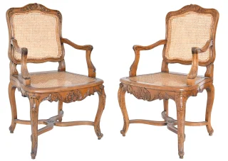 Paire de fauteuils cannés de style Régence