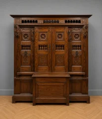 Important Neo-Gothic carved oak hall wardrobe with integrated chest