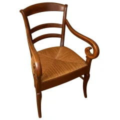 Empire armchair in solid walnut, early 19th century