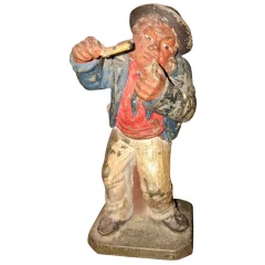 Estatua de personaje popular en hierro fundido policromado