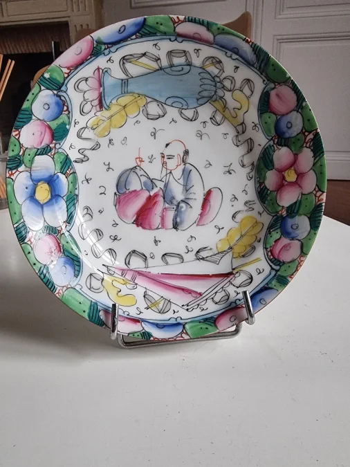 Pair of deep plates in fine Bayeux porcelain