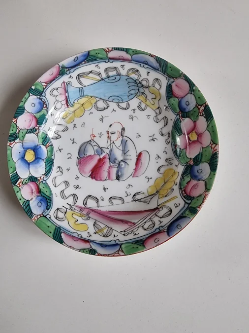 Pair of deep plates in fine Bayeux porcelain