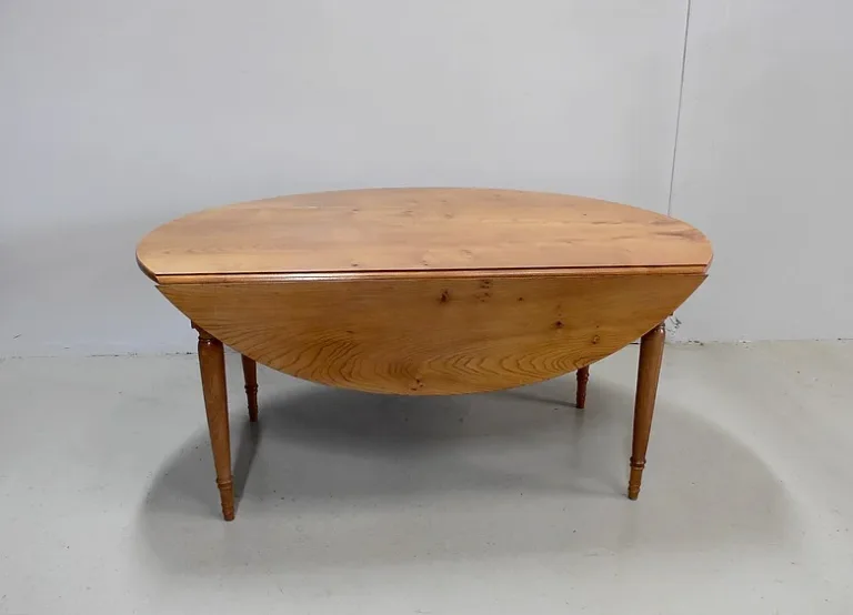 OVAL EXTENDING TABLE