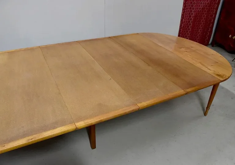 OVAL EXTENDING TABLE