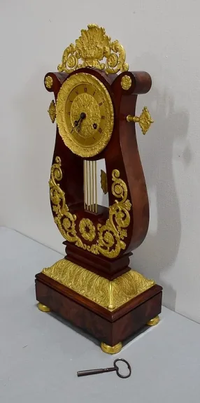 Pendule Lyre en Acajou et Bronze Doré, époque Empire – Début XIXe