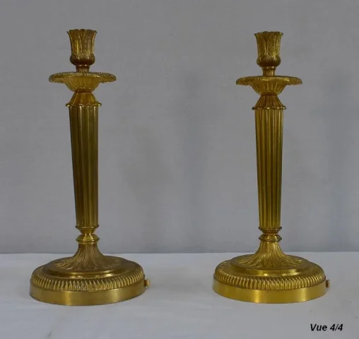 Paire de Flambeaux en Bronze Doré, style Louis XVI – Début XXe