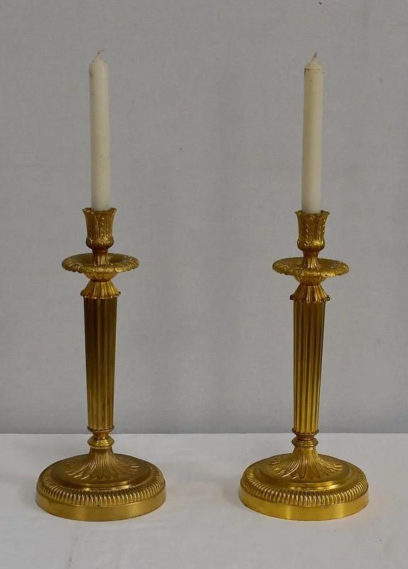 Paire de Flambeaux en Bronze Doré, style Louis XVI – Début XXe
