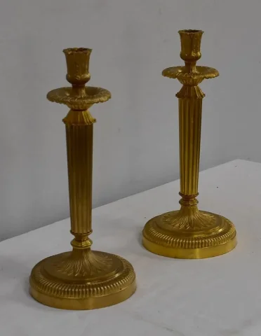 Paire de Flambeaux en Bronze Doré, style Louis XVI – Début XXe