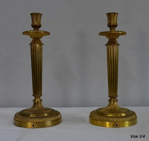 Paire de Flambeaux en Bronze Doré, style Louis XVI – Début XXe